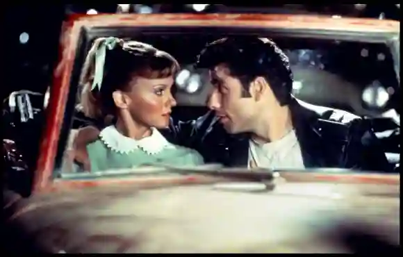 Olivia Newton-John and John Travolta dress up as "Sandy" and "Danny" for first time since Grease