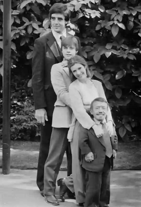 Peter Mayhew, Mark Hamill, Carrie Fisher, Kenny Baker, co-stars in the first Star Wars trilogy, UK, 20th May 1980.