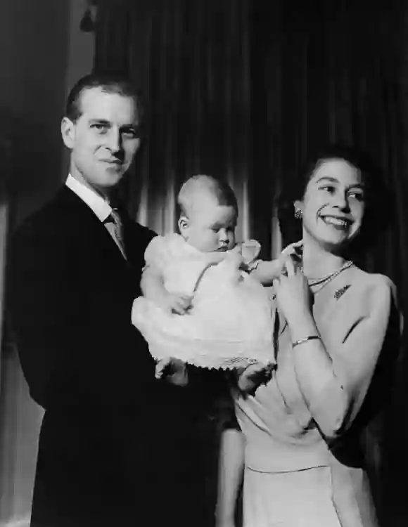 Undated picture showing the future Queen Elizabeth II of England and Prince Philip of Edinburgh posing with their son Prince Charles