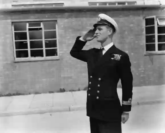 Lieutenant Philip Mountbatten, prior to his marriage to Princess Elizabeth, saluting as he resumes his attendance at the Royal Naval Officers School at Kingsmoor, Hawthorn, England, July 31st 1947