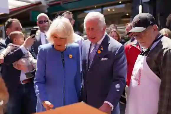 Prince Charles, Prince of Wales, and Camilla, Duchess of Cornwall during a visit to meet local market producers and merchants at ByWard Market, May 18, 2022