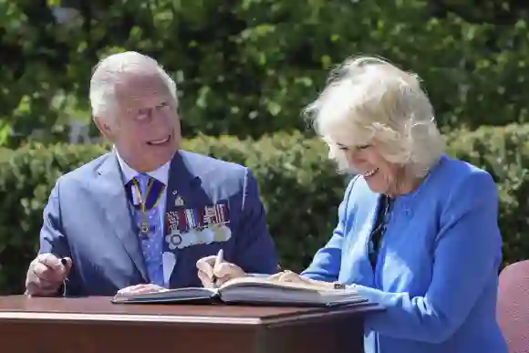 Prince Charles, Prince of Wales and Camilla, Duchess of Cornwall sign the Veteran Affairs Canada Visitor’s Book before departure on day two of their Platinum Jubilee Royal Tour of Canada, May 18, 2022.