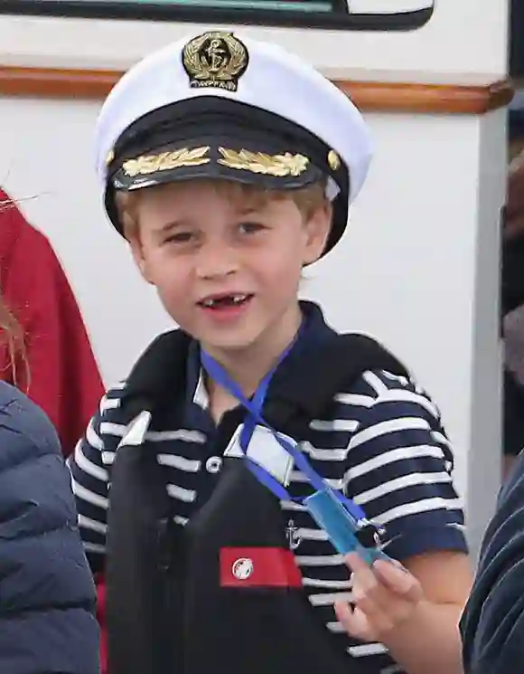 Prince George of Cambridge watches Catherine, Duchess of Cambridge at the helm competing on behalf of The Royal Foundation in the inaugural King's Cup regatta hosted by the Duke and Duchess of Cambridge on August 08, 2019