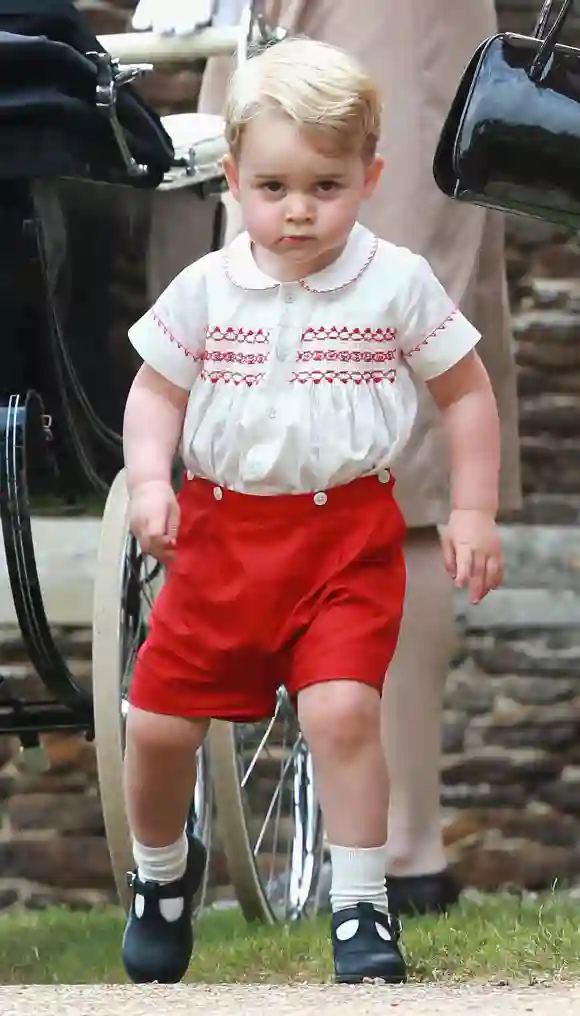 Prince George of Cambridge leaves the Church of St Mary Magdalene on the Sandringham Estate for the Christening of Princess Charlotte of Cambridge on July 5, 2015 in King's Lynn, England