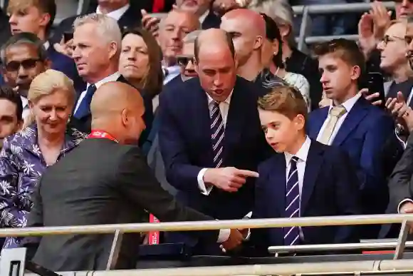 Prince William and Prince George with Pep Guardiola