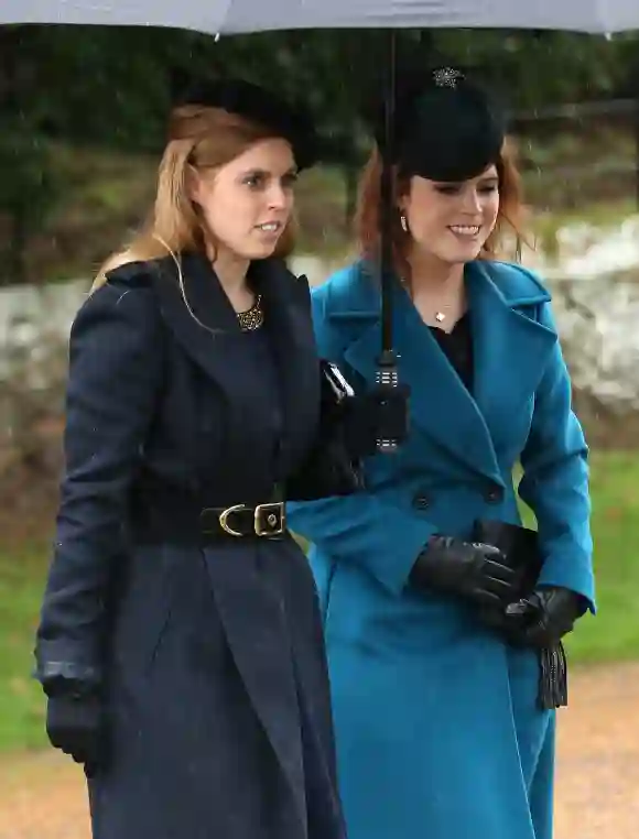 Princesses Beatrice and Eugenie at the 2015 Christmas celebration mass.