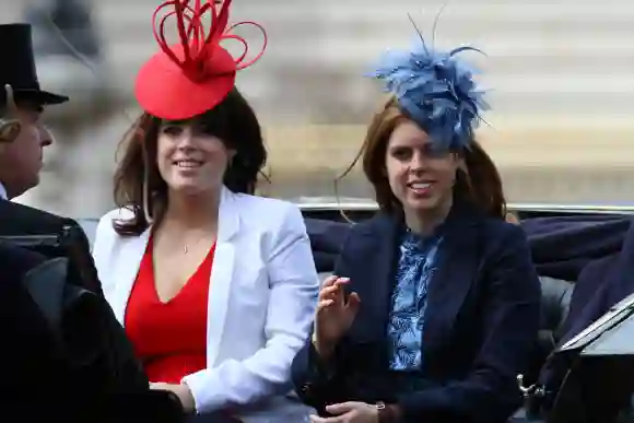 Princess Eugenie and Princess Beatrice ride in a carriage during Trooping the Colour, June 12, 2010.