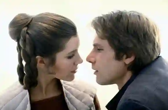 Carrie Fisher as "Princess Leia" and Harrison Ford as "Han Solo"