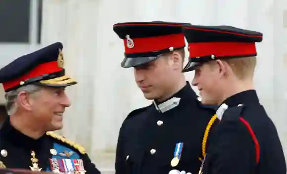 Prince Charles, Prince William and Prince Harry on parade at Sandhurst Military Academy in 2006.