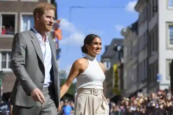 Prince Harry and Duchess Meghan holding hands in Dusseldorf for the Invictus Games 2023
