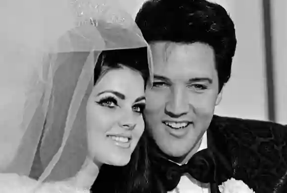 Priscilla Presley and Elvis Presley on their wedding day