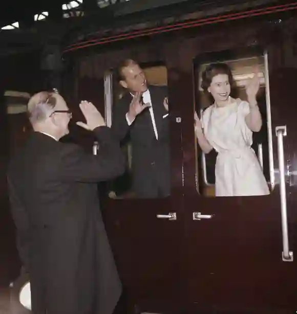 Queen Elizabeth II and Prince Philip leave Manchester by train in May 1961