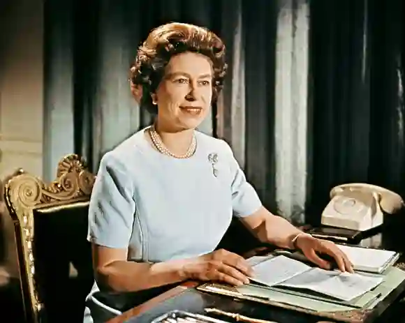 Queen Elizabeth II at Buckingham Palace during the recording of her Christmas message to the Commonwealth which was shown on TV on Christmas day, December 1971.