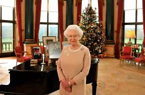 Queen Elizabeth II stands in the music room of Buckingham Palace after recording her Christmas day message to the Commonwealth on December 22, 2008, in London, England.