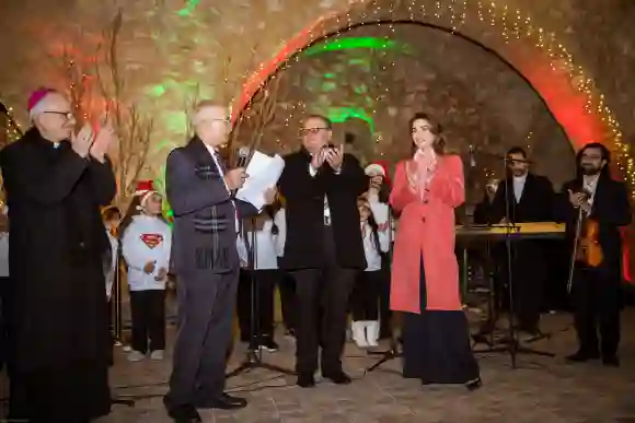 Queen Rania of Jordan takes part in the lighting of the Christmas tree, December 16, 2018.