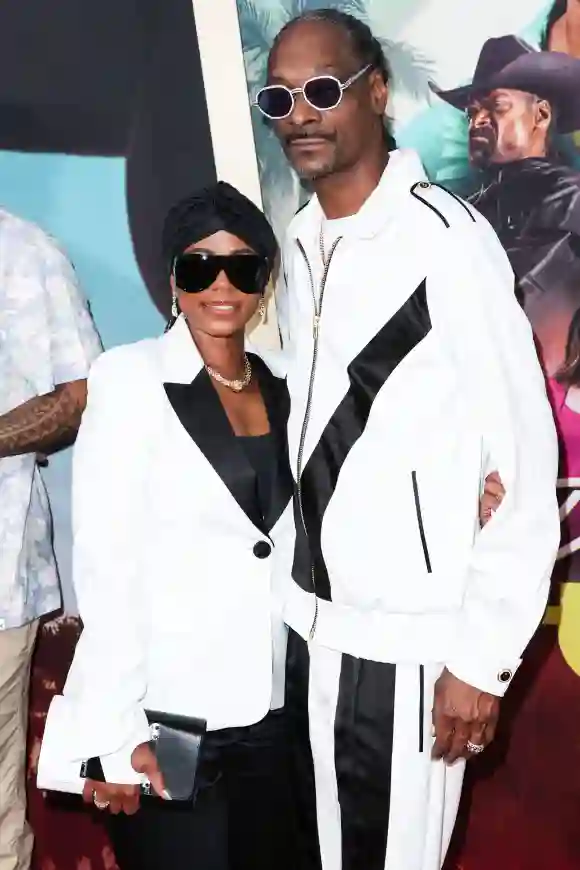 American entrepreneur Shante Broadus and husband/American rapper Snoop Dogg (Calvin Cordozar Broadus Jr.) arrive at the