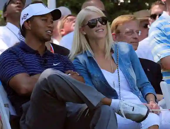 Tiger Woods of the US spekas with his wi