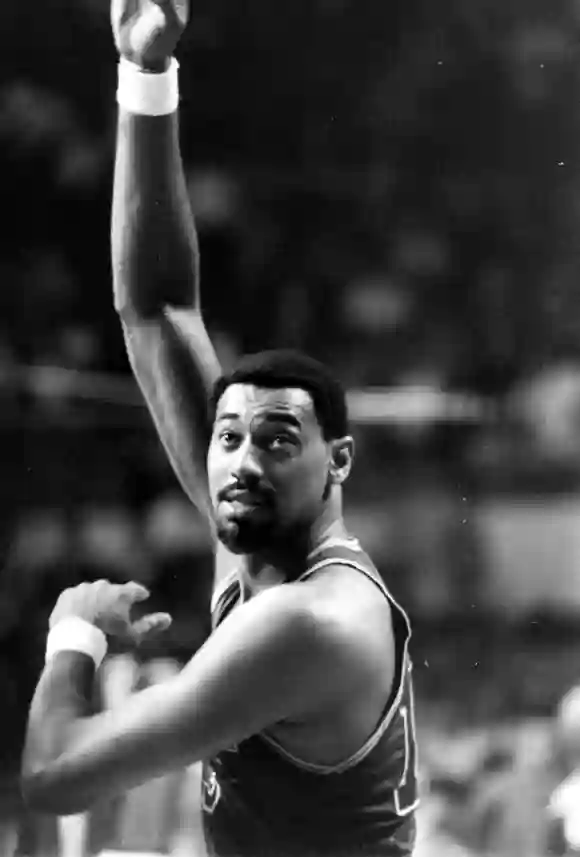 Philadelphia  76'ers,  Wilt  Chamberlain  (#13),  during  game  against  Boston  Celtics,  in  the