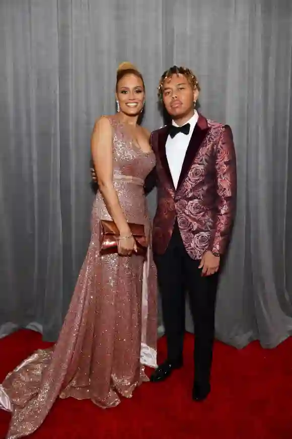YBN Cordae attends the 62nd Annual GRAMMY Awards with a guest on January 26, 2020, Los Angeles, California.