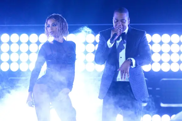 Beyonce and rapper Jay Z perform onstage during the 56th GRAMMY Awards
