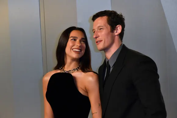 Dua Lipa and Callum Turner are beaming