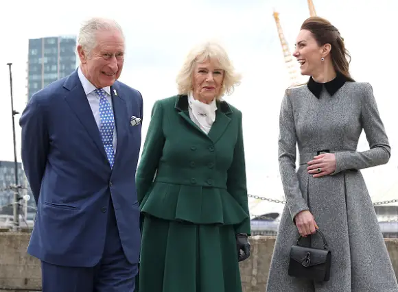 LONDON, ENGLAND - FEBRUARY 03: Prince Charles, Prince of Wales, Camilla, Duchess of Cornwall and Catherine, Duchess of Cambridge smiles during her visit to The Prince's Foundation training site for arts and culture with Prince Charles, Prince of Wales and Camilla, Duchess of Cornwall at Trinity Buoy Wharf on February 3, 2022 in London, England. (Photo by Chris Jackson/Getty Images)
