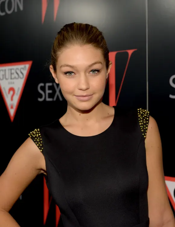 January 08, 2013 - As part of the first company to hire her, Gigi attended the "30 Years Of Fashion And Film And The Next Generation Of Style Icons" by Guess. Although she was new to the industry she was already playing with colors for her hair.