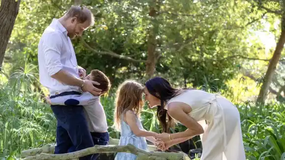 Prince Harry and Meghan Markle with their children