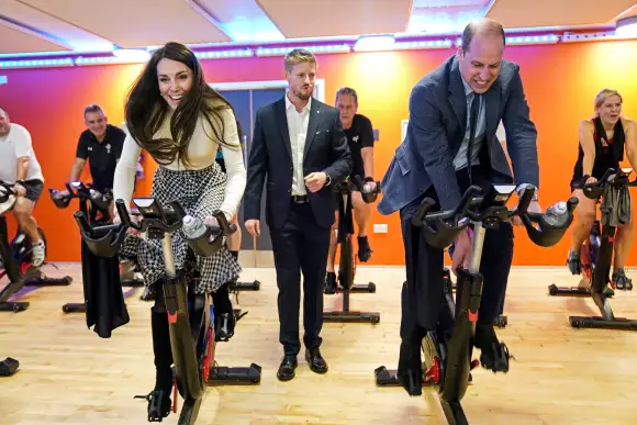 Prince William Princess Kate exercise bikes gym event 2023 photos pictures