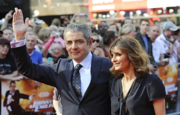 British actor Rowan Atkinson (L) and his