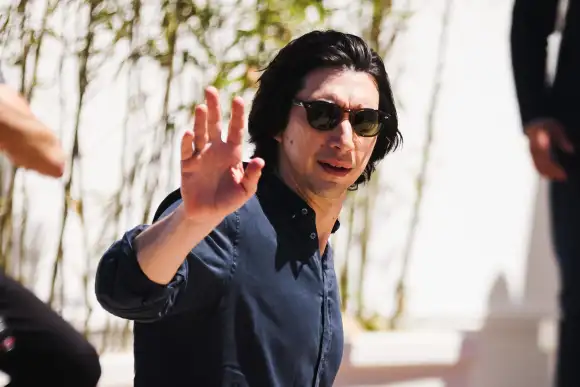 Cast Arrivals At Megalopolis Photocall During The 77th Cannes Film Festival Adam Driver is arriving at the photocall of