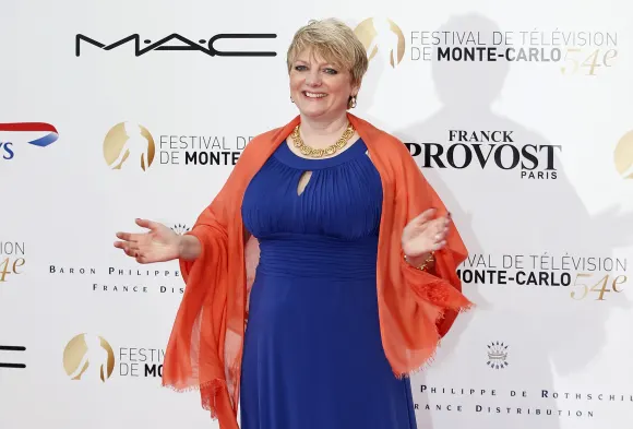 "Our Little Farm" star Alison Arngrim in a blue long dress