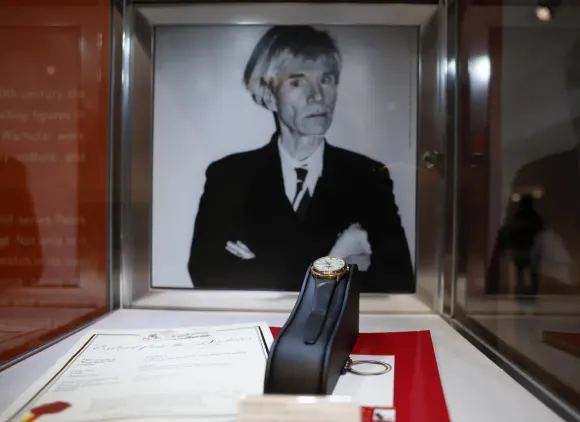 a Patek Philippe 18k Gold Automatic Perpetual Calendar Wristwatch with Moon Phases, Formerly Owned by Andy Warhol is on