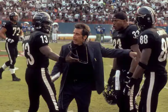 Film Still from Any Given Sunday Jamie Fox Al Pacino LL Cool J © 1999 Warner Photo Credit Robert