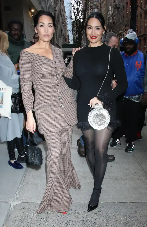 January 25, 2023 Brie Bella and Nikki Bella on Tarmron Hall to talk about new E! mini-series Nikki Bella Says I Do in Ne