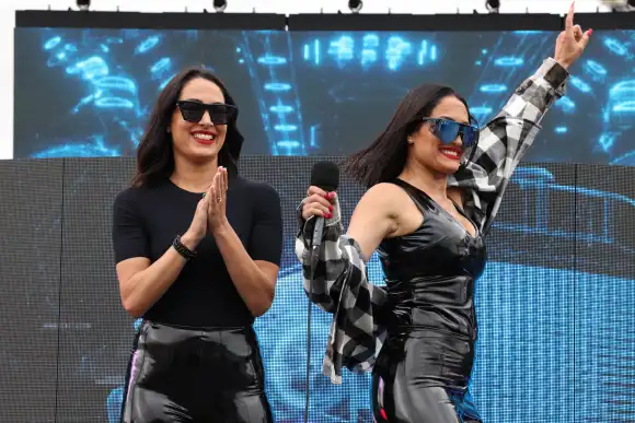 SONOMA, CA - JUNE 12: Professional tag team wrestlers The Bella Twins, Nikki Bella (R) and Brie Bella (L), announce Driv