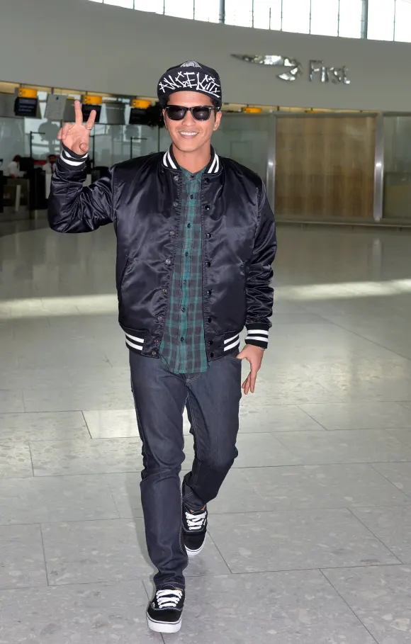 Singer Bruno Mars departs Heathrow Airport for the US United Kingdom Thursday 20th February 2014