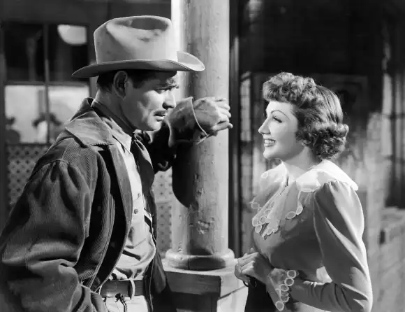 Claudette Colbert;Clark Gable