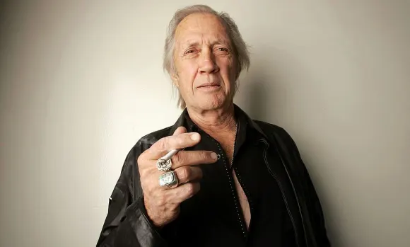 Mysterious Celebrity Causes Of Death conspiracy theories unsolved murders dies how stars musicians actors David Carradine
