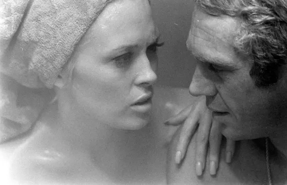 Actor  Steve  McQueen  (R)  and  actress  Faye  Dunaway  (L)  acting  in  the  film  'Thomas  Crown