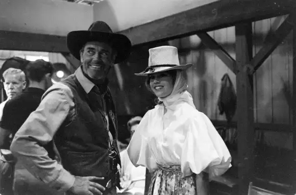 Jane  Fonda  (R)  and  her  father,  Henry  Fonda  (L)  standing  on  the  set  'The  Deputy',  Unit