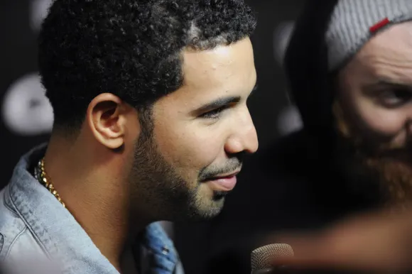 Aubrey Drake Graham and OB Obrien doing an interview with Rap Up TV at the Cash Money Records 4th an