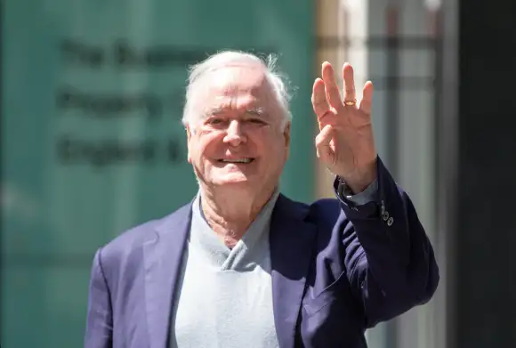 May 26, 2023, London, England, United Kingdom: JOHN CLEESE is seen leaving High Court after attending the phone hacking