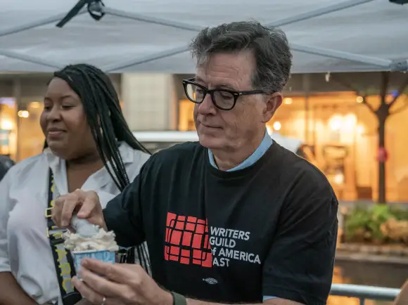 NY: WGA Animation Writers Strike Picket Stephen Colbert serves ice cream to striking members of Writers Guild of America