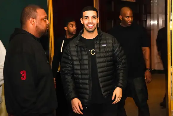 A  shot  of  the  music  artist  Drake  on  the  backstage  with  his  bodyguards Model Released Pro