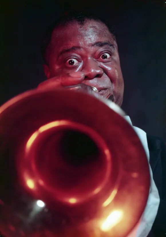 Jazz  musician  Louis  Armstrong  blowing  on  trumpet.Eliot  Elisofon/The  LIFE  Picture  Collect