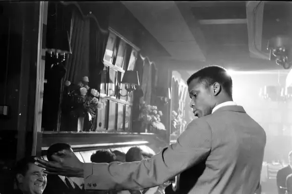 Sidney  Poitier  at  the  premiere  party  for  the  play  'A  Raisin  in  the  Sun'  at  Sardi's  R