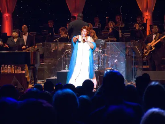 Aretha Franklin performing at the celebration for the official opening of the William J. Clinton Presidential Library No
