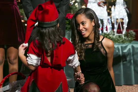 Malia Obama greets a group of elves prior to the taping of TNT s Christmas in Washington program in Washington, D.C. on