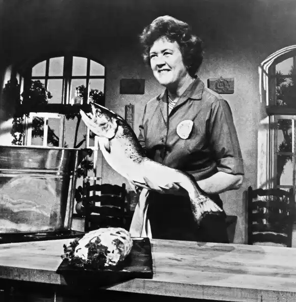 JULIA CHILD (1912-2004). American cook and writer. Child photographed c1973 on the set of her television cooking program